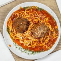 Spaghetti & Meatballs · Our homemade meatballs and classic marinara sauce served on a bed of spaghetti.