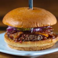 Wild West · Our custom Beef Blend Patty topped with Cheddar Cheese, Applewood Smoked Bacon, Pickles, Red...