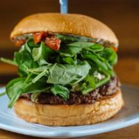 Jackie O · Fresh Ground Lamb Patty, with Feta Cheese, Baby Spinach, Oven-Roasted Tomatoes, and Tzatziki...