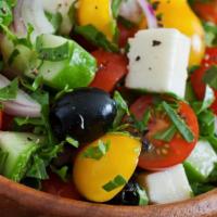 Greek Salad With Tzatziki · Delicious Romaine Lettuce Salad with Onion, Chopped Tomato, Cucumber, Pepperoncini, Feta, Gr...