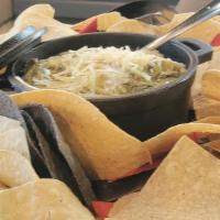 Spinach Artichoke Dip · Spinach and artichoke hearts blended in a cheesy, creamy dip.