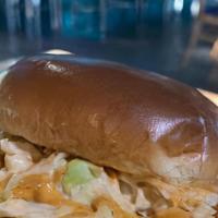 Fried Chicken Sandwich · Crispy buttermilk, breaded chicken topped with coleslaw, mayo, a remoulade drizzle, and pick...
