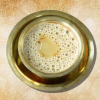 Madras Hot Coffee · Coffee drink made by mixing frothed and boiled milk with the infusion obtained by percolatio...