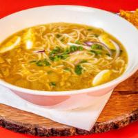 Burmese Noodle Soup / Mohinga · Rice noodle with fish curry soup topped with crispy bean and cilantro.