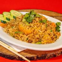 Bangkok Fried Rice · Thai chilies and basil stir fried with green bean, carrot, broccoli.