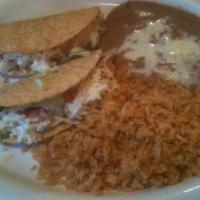 #1  · 1 Taco, 2 Enchiladas with choice of rice or beans.
