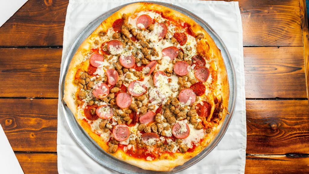 Meat Lovers · Pepperoni, Canadian bacon, Italian sausage, and beef.