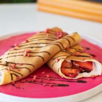 Strawberry & Banana Crepe · Fresh strawberry & banana slices, strawberry cream, Nutella, Freeze dried strawberry