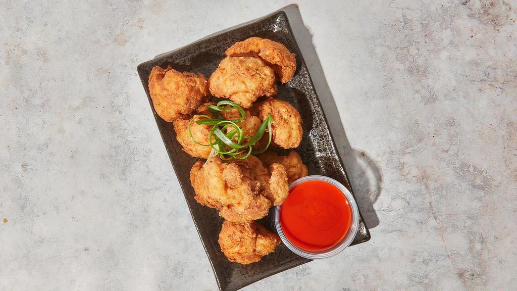 Buffalo Cauliflower Wings · By TLC Vegan Kitchen. TLC’s famous crispy fried cauliflower florets with a side of buffalo sauce and house made chipotle ranch. Vegan. Gluten-Free. Contains nightshades. We cannot make substitutions.