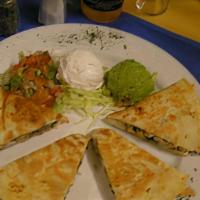 Quesadilla De Fajita · Large flour tortilla, stuffed with cheese, thin slices of mushrooms, onions & poblano pepper...