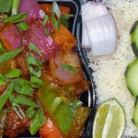 Spicy Chicken  · House-Favourite Tangy chilly sauce tossed w/Onions, Bell Peppers, Tomatoes