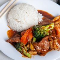 Triple Delight · Spicy. Chicken, beef, and shrimp sautéed with broccoli, carrots, and mushroom in a house spe...