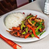 Mongolian Beef · Tender steak slices sautéed with onions and red bell pepper in the special Mongolian sauce.