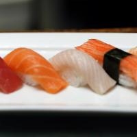 Sushi Sampler · tuna, salmon, yellowtail, shrimp & crabstick