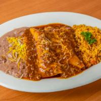 Enchiladas - Beef With Rice & Beans · Corn tortillas rolled and filled with ground taco beef, topped with your choice of  sauce.