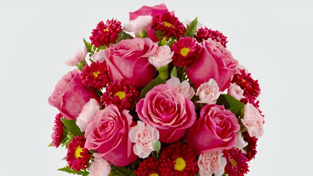  Precious Heart™ Bouquet · The FTD® Precious Heart™ Bouquet is an expression of love and sweet surprises that is set to truly delight your special recipient! Popping with the swirl of hot pink roses surrounded by the alluring textures of red Matsumoto asters and pale pink mini carnations, all beautifully accented with lush greens, this fresh flower arrangement has a winning look everyone can appreciate. Presented in a clear glass vase, this gorgeous flower bouquet is ready to create an excellent birthday, thank you, or anniversary gift. GOOD bouquet is approx. 14