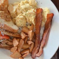 French Toast Platter · Two eggs, two french two eggs, two french toasts, two bacon served with breakfast potatoes