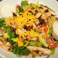 Grilled Chicken Salad · Romaine lettuce, grilled chicken, tomato, bacon, cheddar cheese and avocado