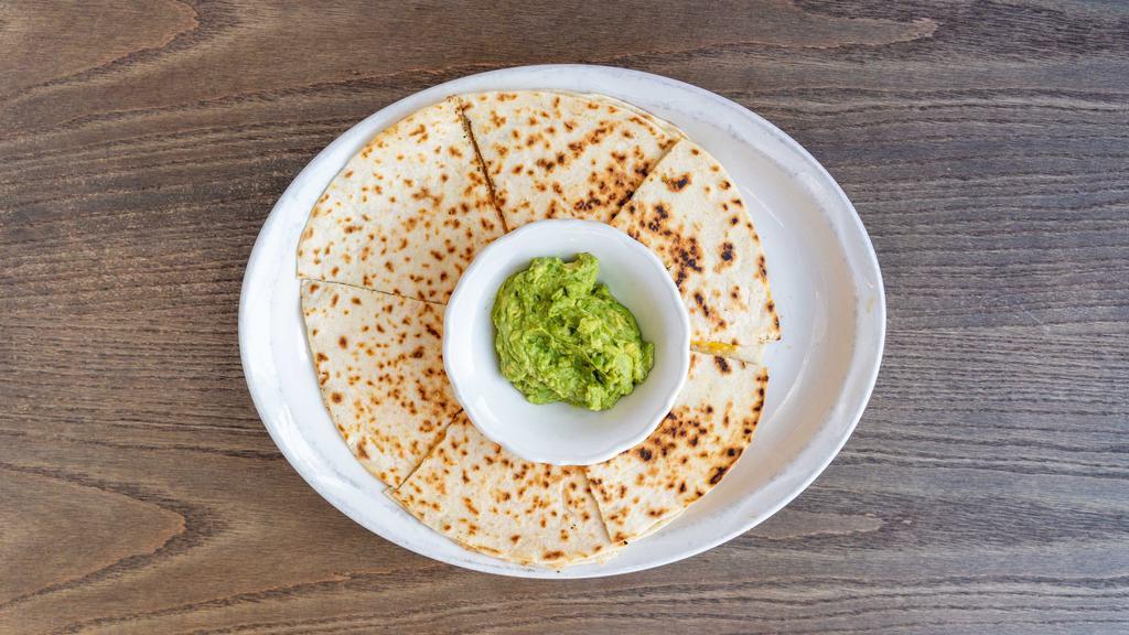 Quesadillas · Four flour tortillas w/ beef, chicken fajita or grilled vegetables and monterey jack cheese. Served w/ guacamole, sour cream and jalapeños.