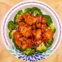 Orange Chicken · Spicy. Breaded deep fried white meat with orange peel in sweet and spicy brown sauce.