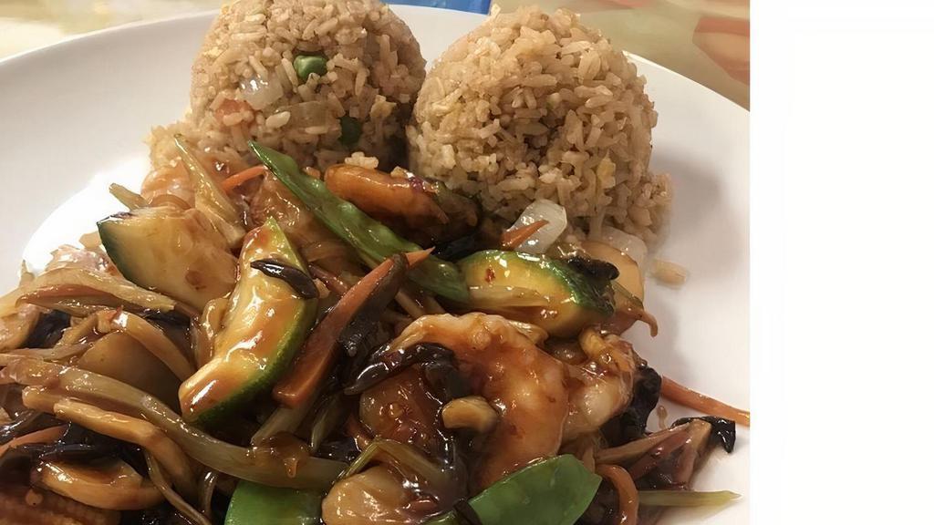 Spicy Garlic · Sauteed shiitake mushroom, snow peas, carrot, zucchini, bamboo, bell pepper, onion, baby corn, and chestnut with spicy garlic brown sauce. Served with steamed rice.