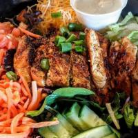Grilled Or Blackened Chicken Salad · Grilled or blackened chicken served on a bed of iceberg or spring salad mix, shredded chedda...