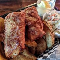Fish & Chips · Beer-battered cod. Served with tartar sauce, coleslaw, and home slice potatoes.
