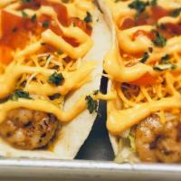 Shrimp Tacos · Blackened or fried shrimp with lettuce, pico de gallo, grated cheddar and jack cheese with b...