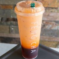 Iced Thai Milk Tea · Freshly brewed Thai tea complimented by the creaminess of lactose-free milk  for a rich tast...