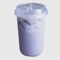 Hot Taro Milk Tea · A lightly-caffeinated green milk tea with a strong taro flavor.