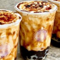 Creme Brulee Dirty Boba · A creamy treat filled with brown sugar, boba, cheese milk foam and topped with a caramelized...
