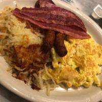 Angela'S Special · Two eggs, bacon, sausage, ham and has browns and two pancakes