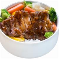 Bbq Chicken · Rice, steamed vegetables and barbecue chicken.
460 cal.