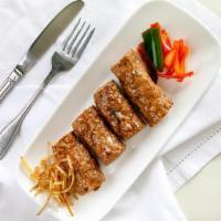 Seekh Kebab App · Ground lamb and chicken blended with special spices and herbs cooked on skewers in tandoor.