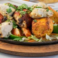 Mixed Grill Kebab · Combination of all tandoori specialties. (Malai tikka, tandoori chicken, seekh kebab, shrimp...