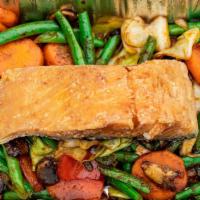 E9 Salmon Prik Khing · King salmon fillet topped with mushrooms, bell peppers, cabbage, carrots and string beans in...