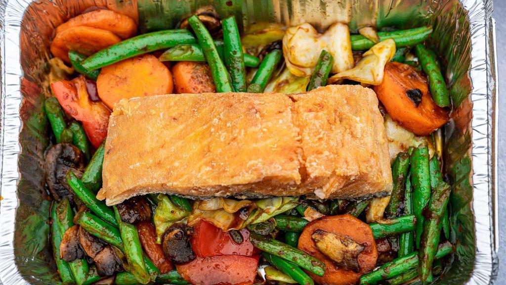 E9 Salmon Prik Khing · King salmon fillet topped with mushrooms, bell peppers, cabbage, carrots and string beans in fresh ginger paste sauce