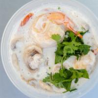 E11 Tom Kha · Rich and creamy Thai chicken coconut soup with mushrooms, lemongrass and chiles