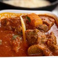 Choice Of Curry Lamb Or Chicken Curry With Rice & Naan · 