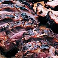 Simply Smoked Ribs · Smoked  Ribs served w/ 2 sides and a drink