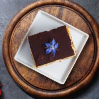 Chocolate Cheeseecake · Features a buttery Oreo cookie crust, an ultra-rich decadent chocolate filling, and is toppe...