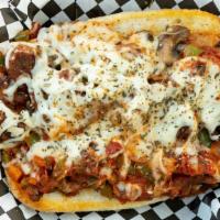 Pizza Sub · Garlic buttered amoroso open faced bun with pepperoni, Italian sausage, grilled onions, mush...