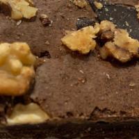 Chocolate Walnut Brownie · Best Served warmed.  Chocolate Fudge and Walnuts