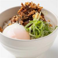 Mini Pork Chashu Bowl · Poached egg, green onion, fried onion, sesame seed, seaweed.