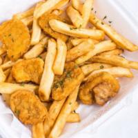 Chicken Nuggets With Fries · Tender chicken nuggets juicy on the inside and crispy on the outside.