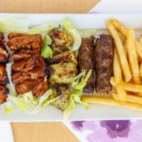 Mix Grill Platter · Comes with half order of chicken malai boti, chicken bihari, beef bihari, beef sheek kabab
a...