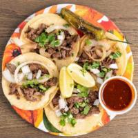 Asada Mini Street Tacos (4) · Beef (Sirloin meat) with double mini tortilla. Order come with pinto beans.