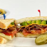 Blt Supreme · Bacon topped with avocado, cheddar cheese, lettuce, & tomato. Served on toasted white bread....