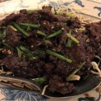 Mongolian Beef · Tender beef with green onions.
