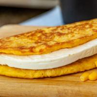 Cachapa Operada · Cachapas are gluten-free corn cakes, rustic pancakes perfect for breakfast or brunch. Served...